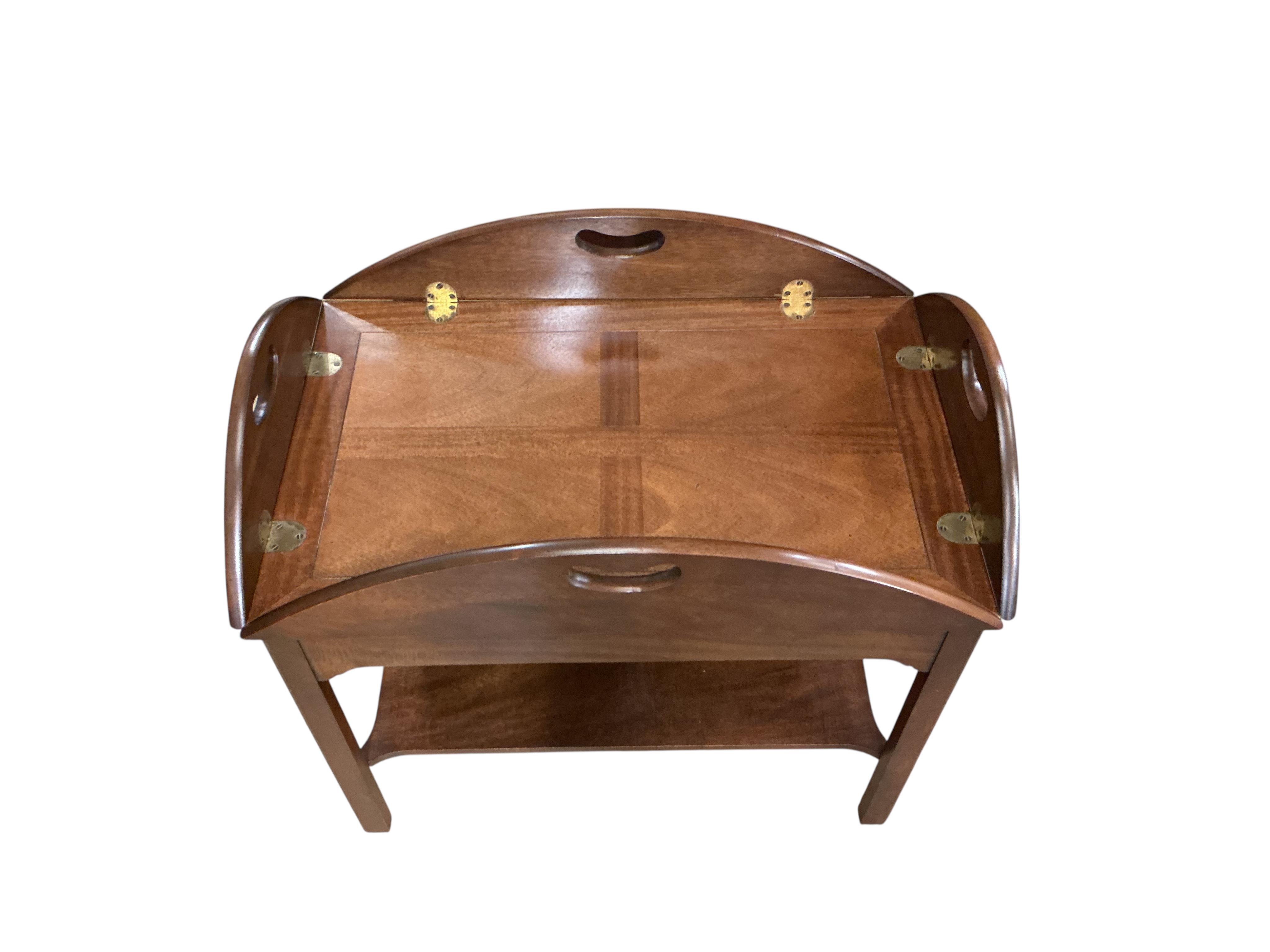 A reproduction George III style mahogany butler's tray, on stand, width 74cm, depth 48cm, height 68cm